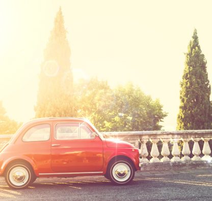 Can a non-Italian citizen legally purchase or own a car in Italy?